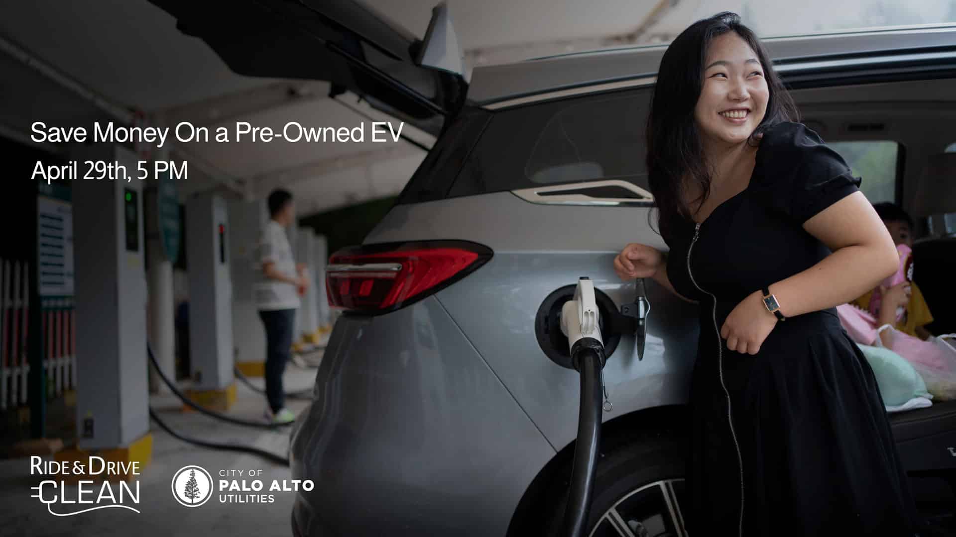 Asian woman charging her new EV