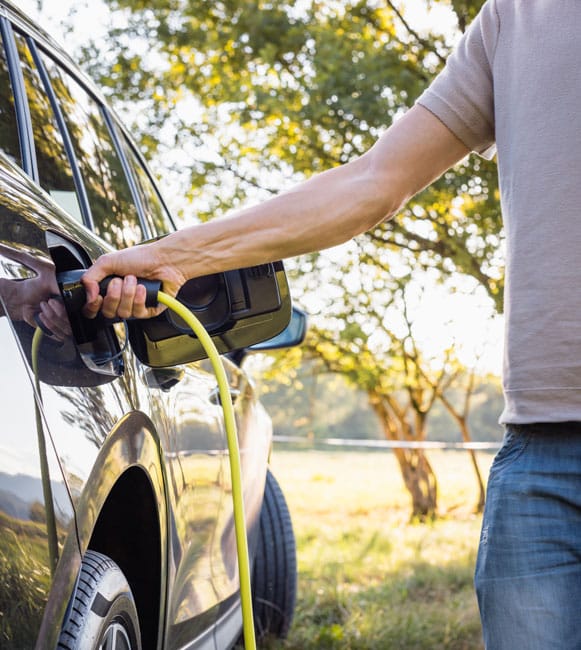 Man charging his EV